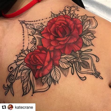 Top 10 rose between breast tattoo ideas and inspiration